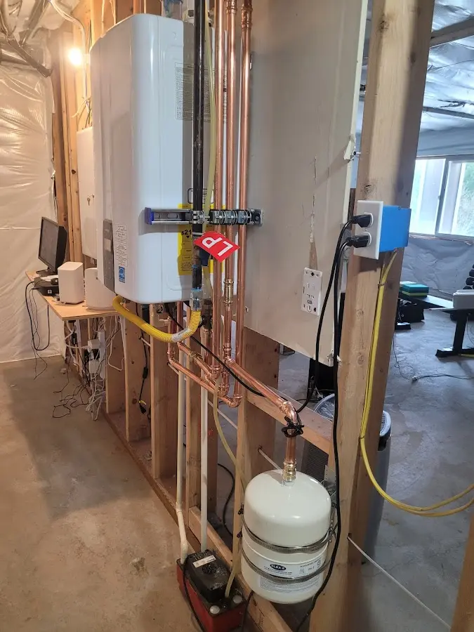 Licensed plumber repairing a kitchen sink in Mukilteo